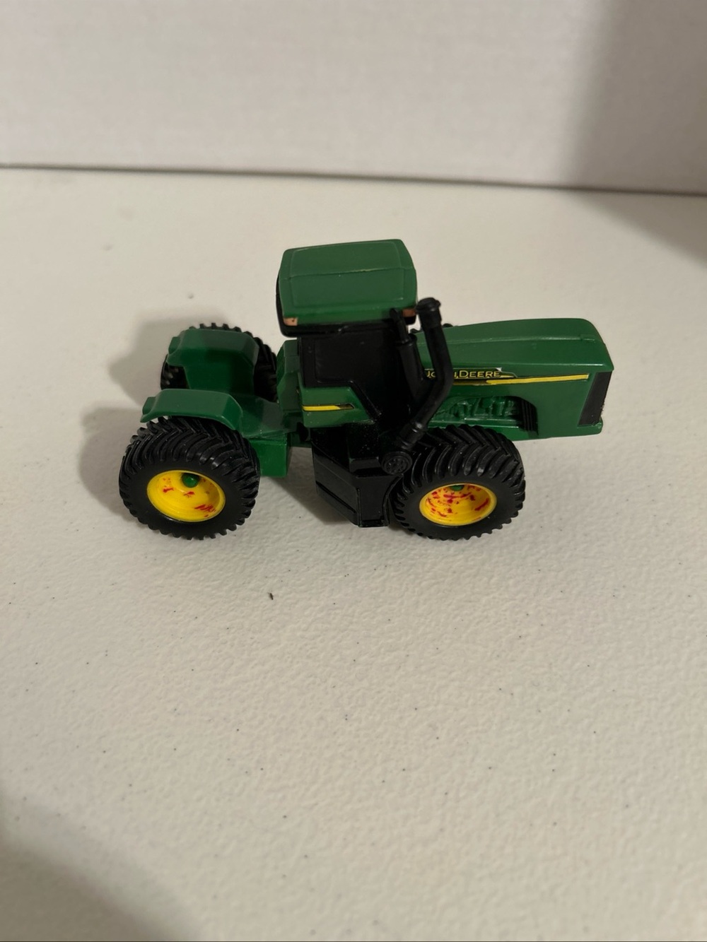 Die cast John Deere Green and Yellow Mini Tractor 1:64 Ertl